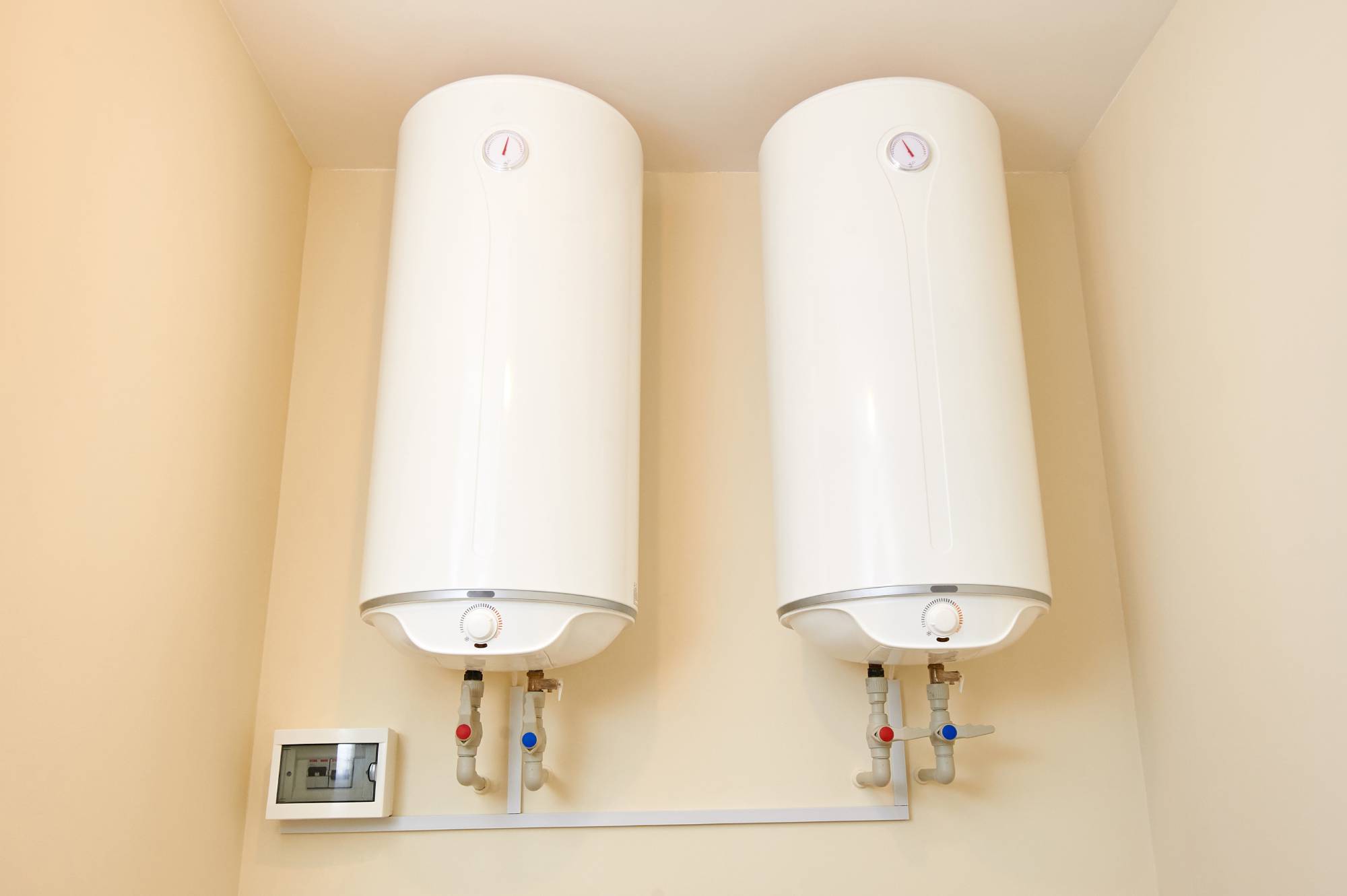 two-electric-water-heaters-on-the-wall-home-wall-2025-04-01-05-49-39-utc (1)